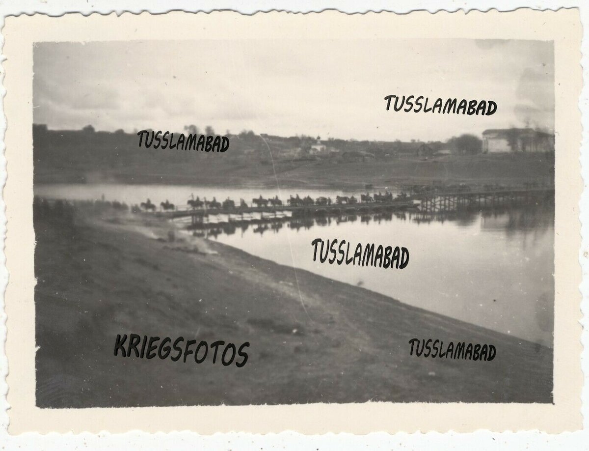 Subzow-Wolga-Twer-Brücke-Häuser-Soldaten-Russland-Smolensker.jpg