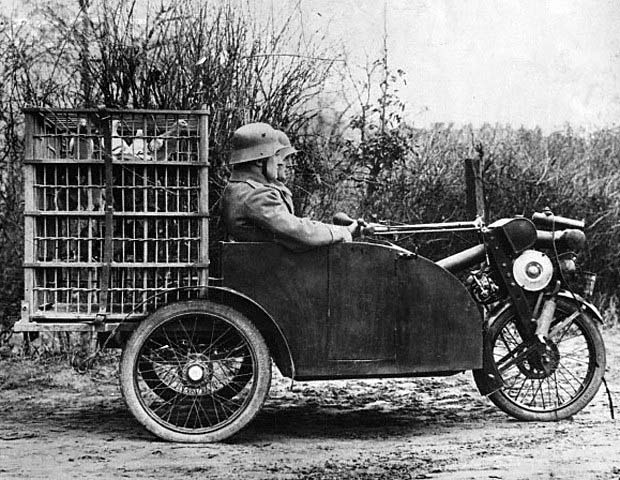 Front-wheel-drive three-wheeler with onboard carrier pigeon birdcage.jpg