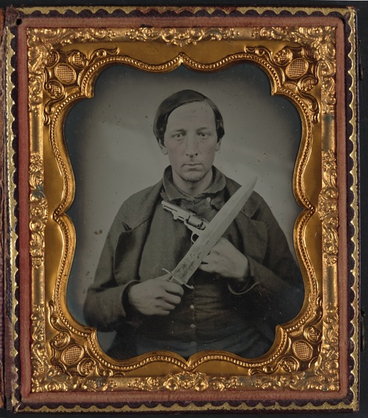 Unidentified-soldier-in-Confederate-uniform-with-knife-and-revolver.jpg
