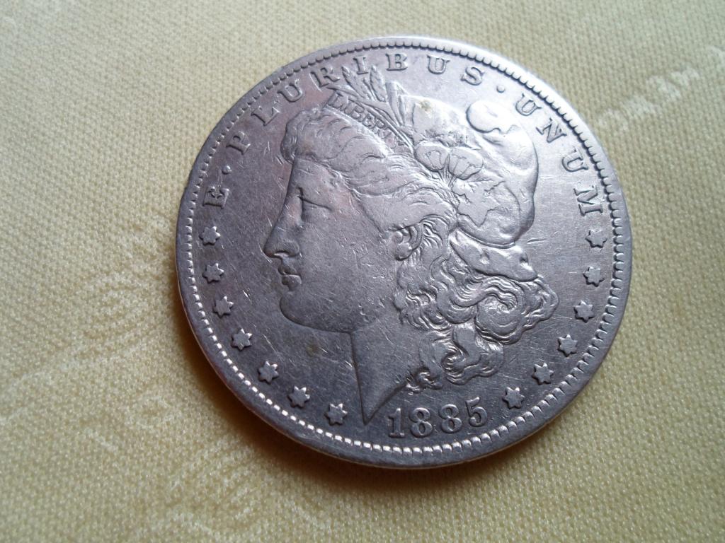 1_dollar_1885_g_ssha_morgan_dollar_serebro.jpg